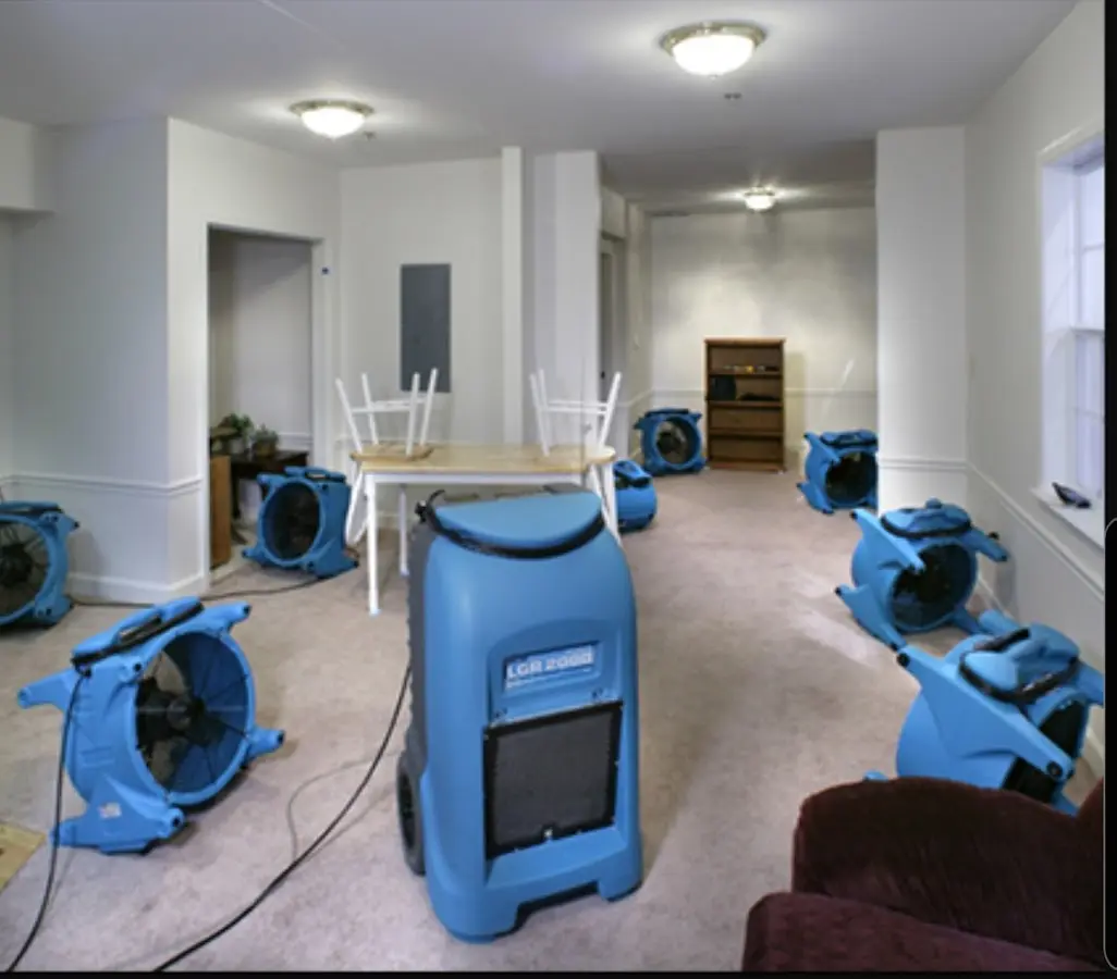 Air movers and dehumidifier setup for Water Damage Restoration in Valley City